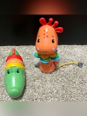 Fisher Price baby Clicker Clacker toys Giraffe Alligator lot of 2